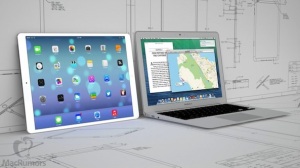 One of the iPad pro concepts sitting next to a MacBook Air.